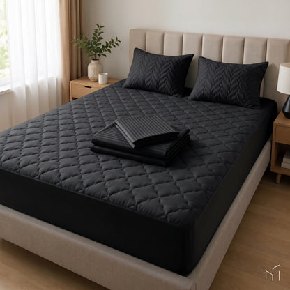 1 Protector acolchado + 1 Set de sabans algodón + 2 Almohadas acolchadas